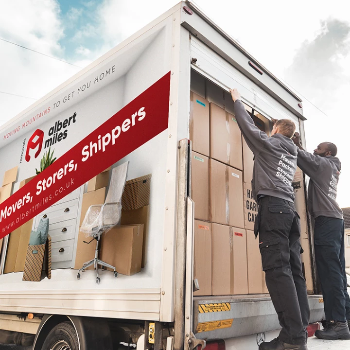 Albert Miles removal team loading a moving van